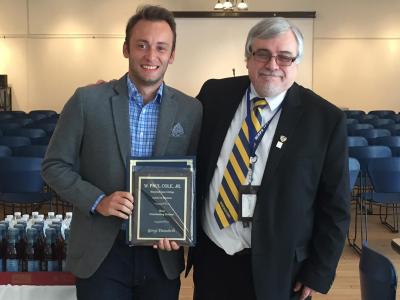 Bluefield State College student Giorgi Datashvili(left) has accepted an offer of employment from a nationally recognized “Top 50 Public Accounting Firm.”  He is pictured with Phillip Imel, Dean of the W. Paul Cole, Jr. School of Business at BSC, as Dean Imel presented him with the “Most Outstanding Student” award during the Cole School of Business’ 2019 awards program.