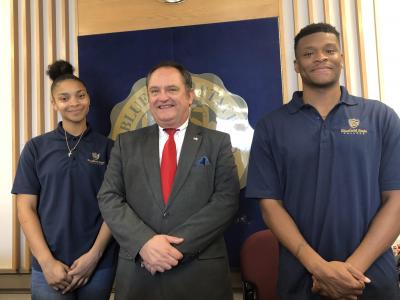 Bluefield State College Student Ambassadors Kylah Webb (left) and Darren Crump (right) are pictured with BSC Provost Dr. Ted Lewis at the Conley Hall welcome & information desk. 