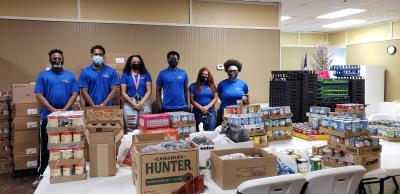 With community and campus support, the Emerging Leaders Institute recently delivered more than 470 nonperishable food items to the Bluefield Union Mission.   Pictured (left-to-right) are Bluefield State College Emerging Leaders Institute members Desmond Freeman; Brandon Anyanwu (ELI President), Raenel Crenshaw, Bassy Sissoko, Autumn Miller, and Ashlei Kelly (ELI Secretary).  BSC faculty member Linda P. Trigg is ELI’s Director.