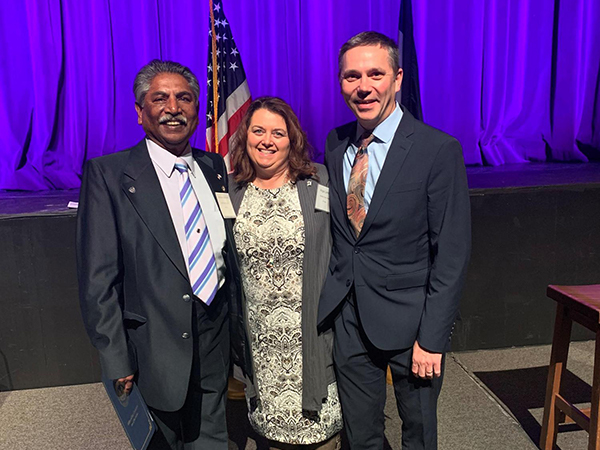 Dr. Sudhakar Jamkhandi (left), Bluefield State College Professor of English and Director of the Office of International Initiatives, and Dr. Angela Lambert (center), Dean/Bluefield State College School of the School of Nursing and Allied Health, are pictured with Matt Turner, Executive Vice Chancellor for Administration/WV Higher Education Policy Commission during the recent Public Service Recognition Week ceremony in Charleston.  Dr. Jamkhandi received a certificate of recognition for his 35 years of servi