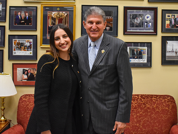 Bluefield State University exchange student Selina Poljak (left) is pictured with U.S. Senator Joe Manchin during her recent Congressional Internship in Washington, DC.  A participant in the Congress-Bundestag Youth Exchange program, she has just begun a second internship at the Mercer County Courthouse. 